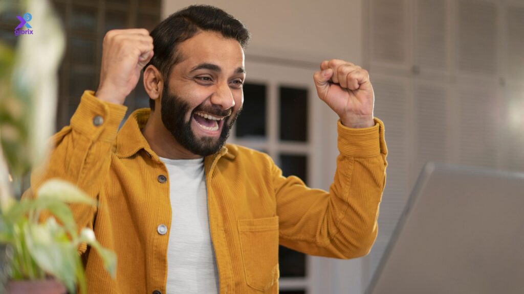 A happy young adult celebrating financial success after improving their credit score in the USA.