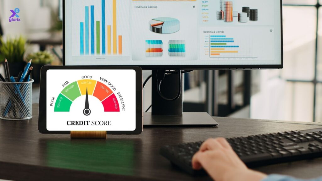 Young adult checking credit score on laptop and smartphone with credit report apps